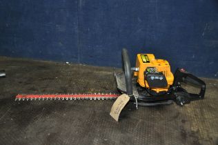 A PARTNER HG 55-12 PETROL HEDGE TRIMMER with 22in blade (engine pulls freely but hasn't started)