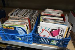TWO BOXES OF SINGLE RECORDS, over three hundred records, artists include The Pretenders, UB40,