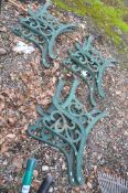 THREE PAIRS OF MODERN CAST IRON BENCH ENDS with green paint scrolled detail