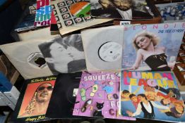 TWO CASES OF SINGLES RECORDS, approximately two hundred singles, by artists to include Duran