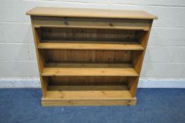 A MODERN PINE OPEN BOOKCASE, with two fixed shelves, width 110cm x depth 35cm x height 102cm (