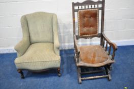 A 19TH CENTURY ARMCHAIR, with swept armrests, on front cabriole legs, width 70cm x depth 76cm x