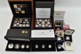 ROYAL MINT CASED COINS, A 30th ANNIVERSARY OF THE £1 COINS ROYAL ARMS SILVER SET, a 2008 Britannia