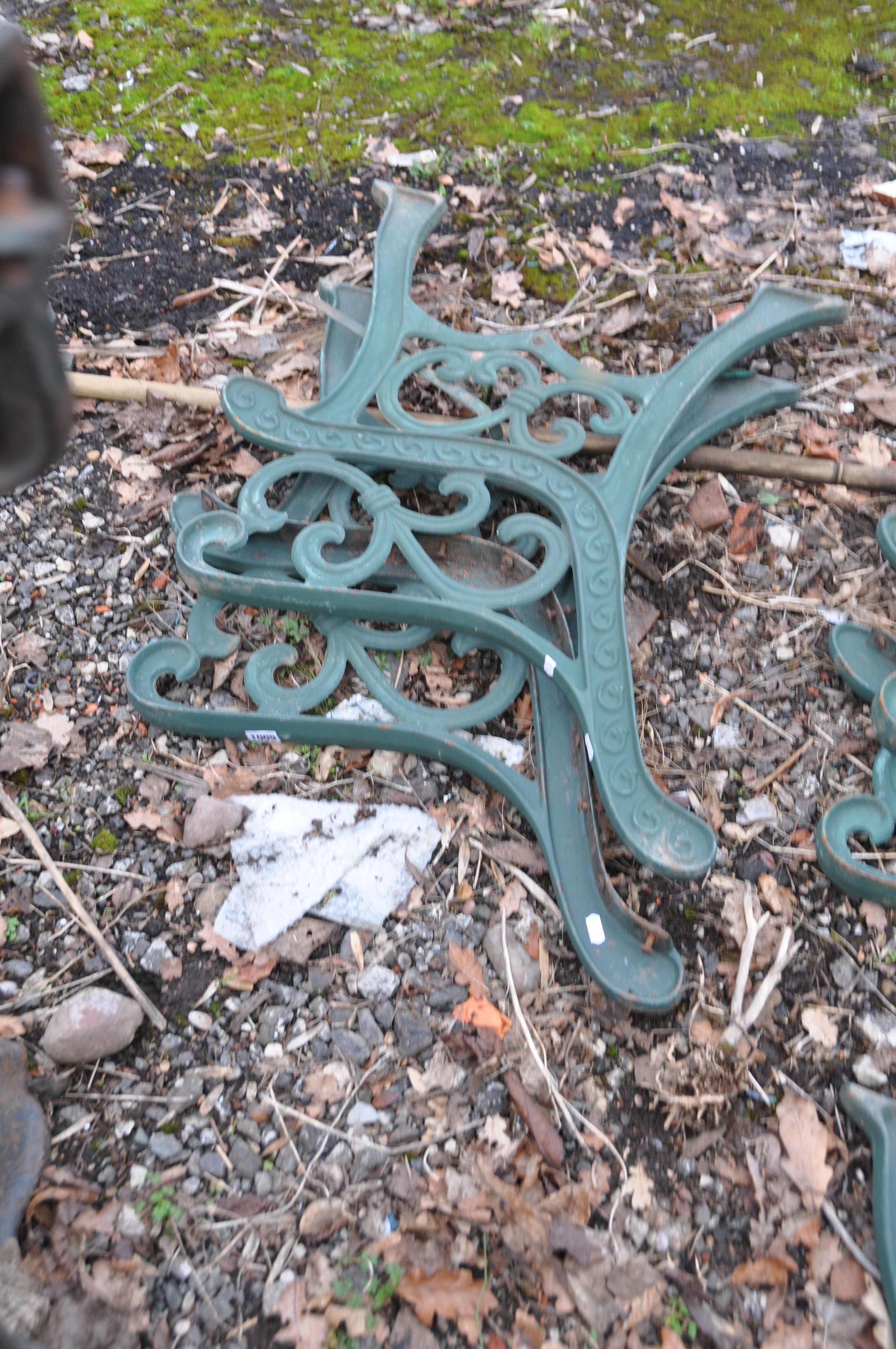 THREE PAIRS OF MODERN CAST IRON BENCH ENDS with green paint scrolled detail - Image 4 of 4