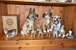 A GROUP OF DOG ORNAMENTS, comprising a large 'Barkers' Alsatian 90399, height 41cm, a Country