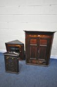 THREE GEORGIAN OAK HANGING CORNER CUPBOARDS, the double panelled cupboard doors enclosing three