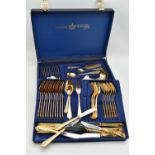 A 'BESTECKE' CANTEEN OF CUTLERY, a blue case signed 'Bestecke Solingen', encasing a twelve person