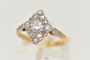 A MID CENTURY DIAMOND CLUSTER RING, a principally set round brilliant cut diamond, approximate