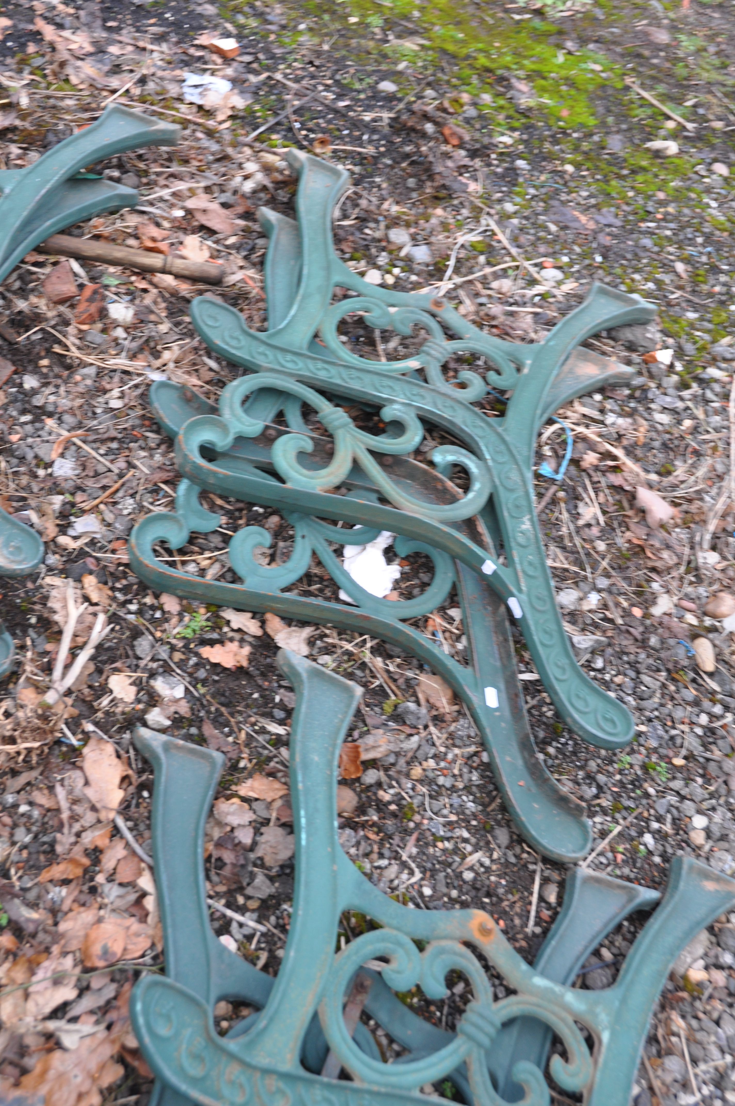 THREE PAIRS OF MODERN CAST IRON BENCH ENDS with green paint scrolled detail - Image 3 of 4
