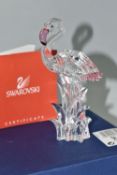 A BOXED SWAROVSKI CRYSTAL 'FLAMINGO' SCULPTURE, depicting a Flamingo with pink beak and tail