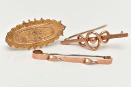 THREE EARLY 20TH CENTURY BROOCHES, the first a 9ct gold knot style bar brooch, fitted with a base