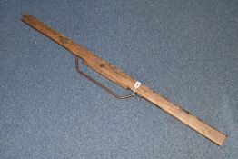 A BRITISH RAILWAYS WOODEN TRACK GAUGING TOOL, with steel handle, inset spirit level cant measure
