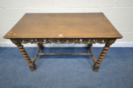 A REPRODUCTION GEORGIAN STYLE OAK CONSOLE TABLE, with a foliate carved apron, raised on barley twist