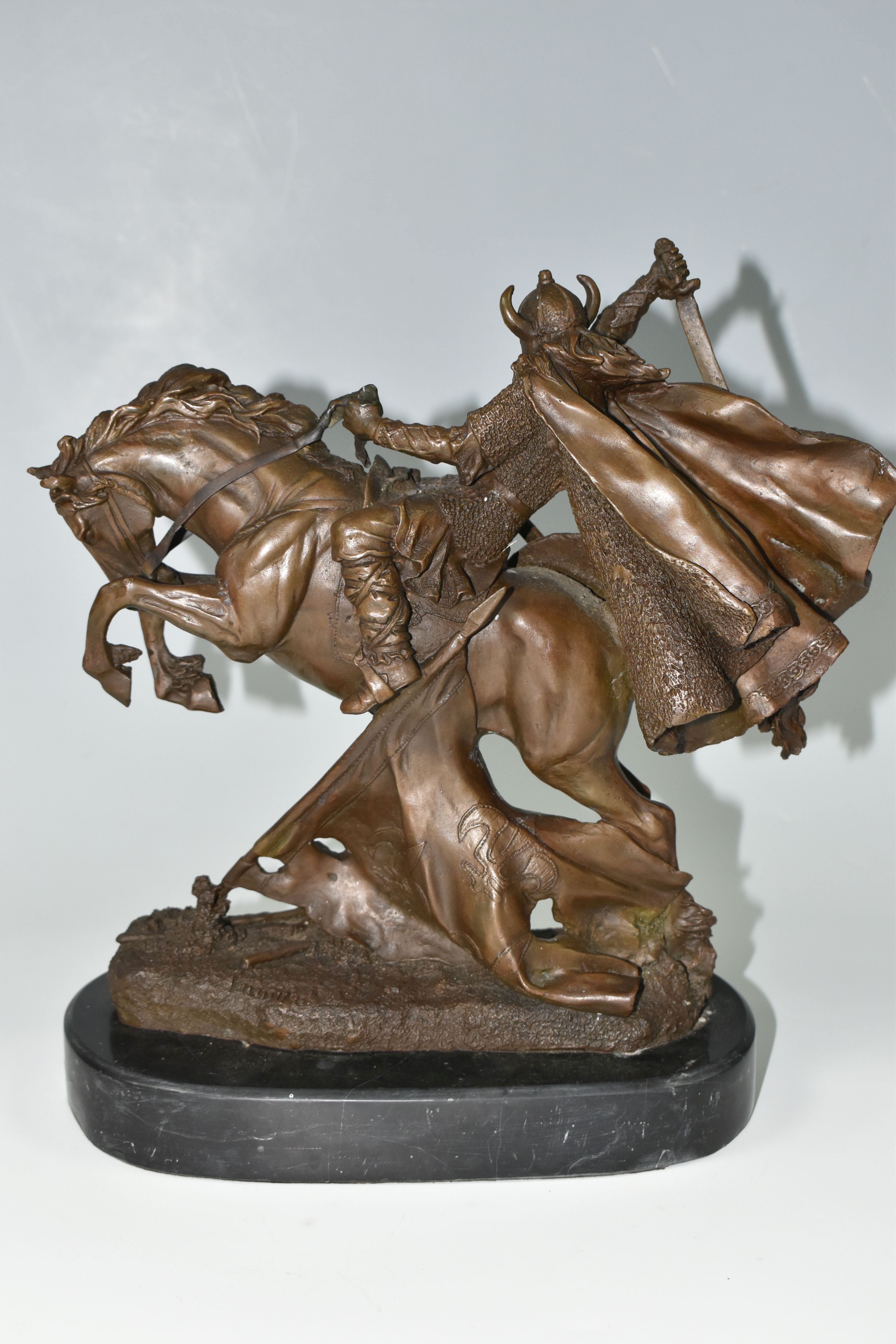 A MODERN BRONZE SCULPTURE OF A VIKING WARRIOR, depicting the warrior on horseback in battle, - Image 7 of 9