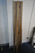 A QUANTITY OF OAK ARCHITRAVE, to include ten matching 210cm lengths, two 102cm lengths, and two