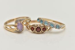 THREE 9CT GOLD GEM SET RINGS, the first of cross over design set with a central oval cut amethyst
