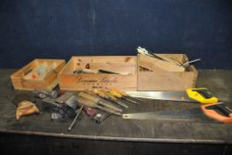 FOUR WOODEN TRAYS CONTAINING TOOLS including a Woden engineers vice, brace bits, chisels, saws, etc