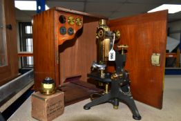 A CASED W. WATSON & SONS LTD BRASS AND BLACK LACQUERED MICROSCOPE, serial no.11632, the case