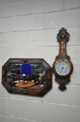 AN OAK FRAMED BEVELLED EDGE WALL MIRROR, 69cm x 46cm, and an oak aneroid barometer (condition