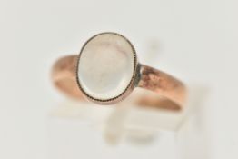 A MOONSTONE SINGLE STONE RING, set with an oval moonstone cabochon, rub over set with millegrain