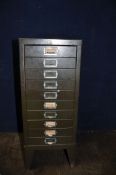 A VINTAGE METAL CHEST OF TEN FILE DRAWERS containing screws, nuts and bolts, and electrical