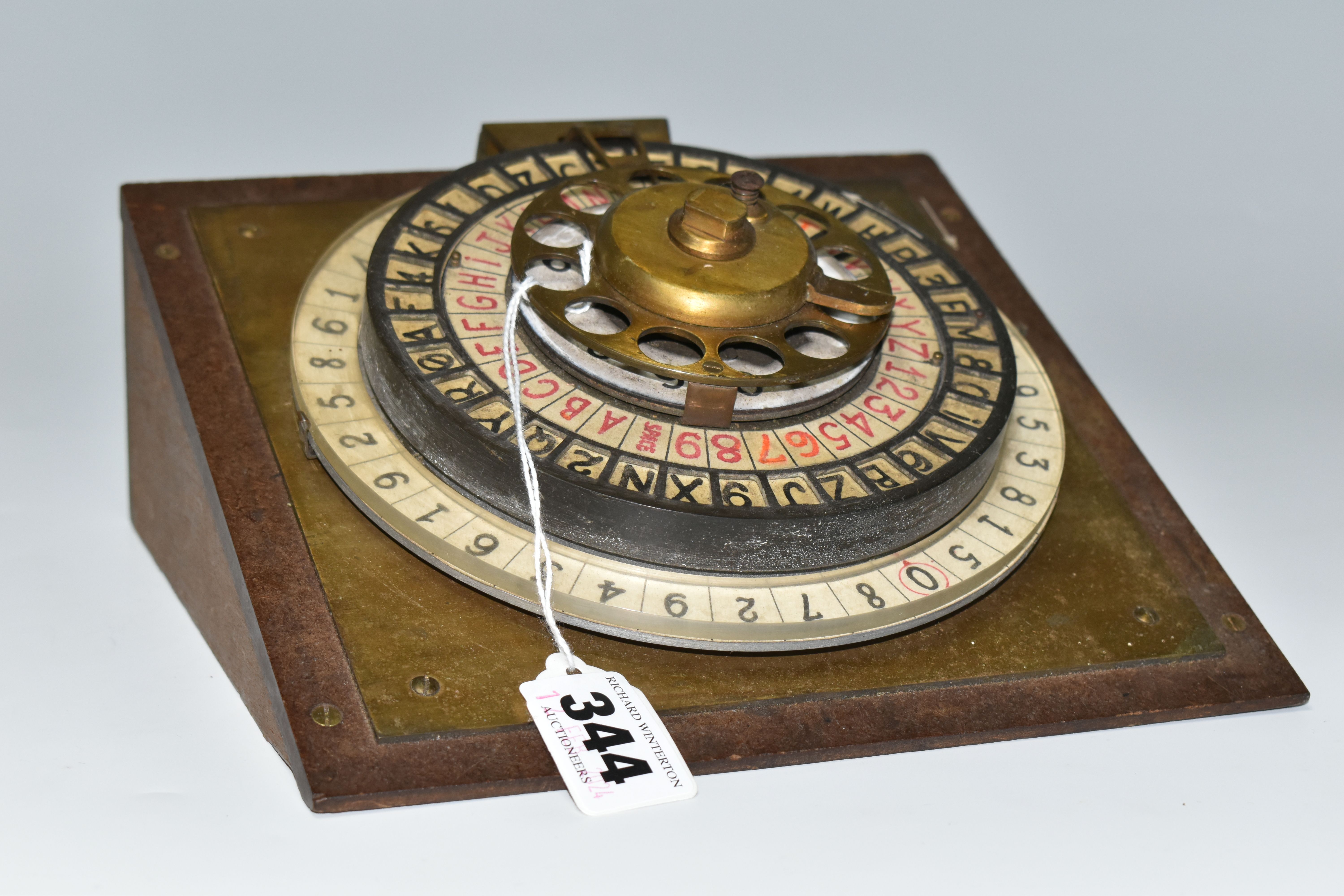 A SCRATCHBUILT DISK CIPHER/CODING MACHINE, with four wheels of letters and numbers, on an angled - Image 2 of 7