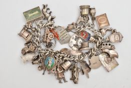 A CHARM BRACELET, curb link bracelet fitted with a heart padlock clasp, stamped 'Sil', fitted with