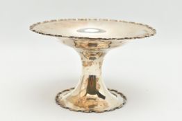 A GEORGE V SILVER PEDESTAL DISH, circular form with wavy rim, tapering raised pedestal on a round
