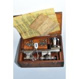 A WATCHMAKER'S LATHE, by Ime of London, in a fitted wooden case with instructions and accessories,