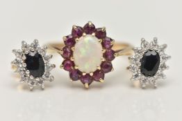 A 9CT GOLD GEM SET RING AND A PAIR OF EAR STUDS, the ring designed as a central opal within a