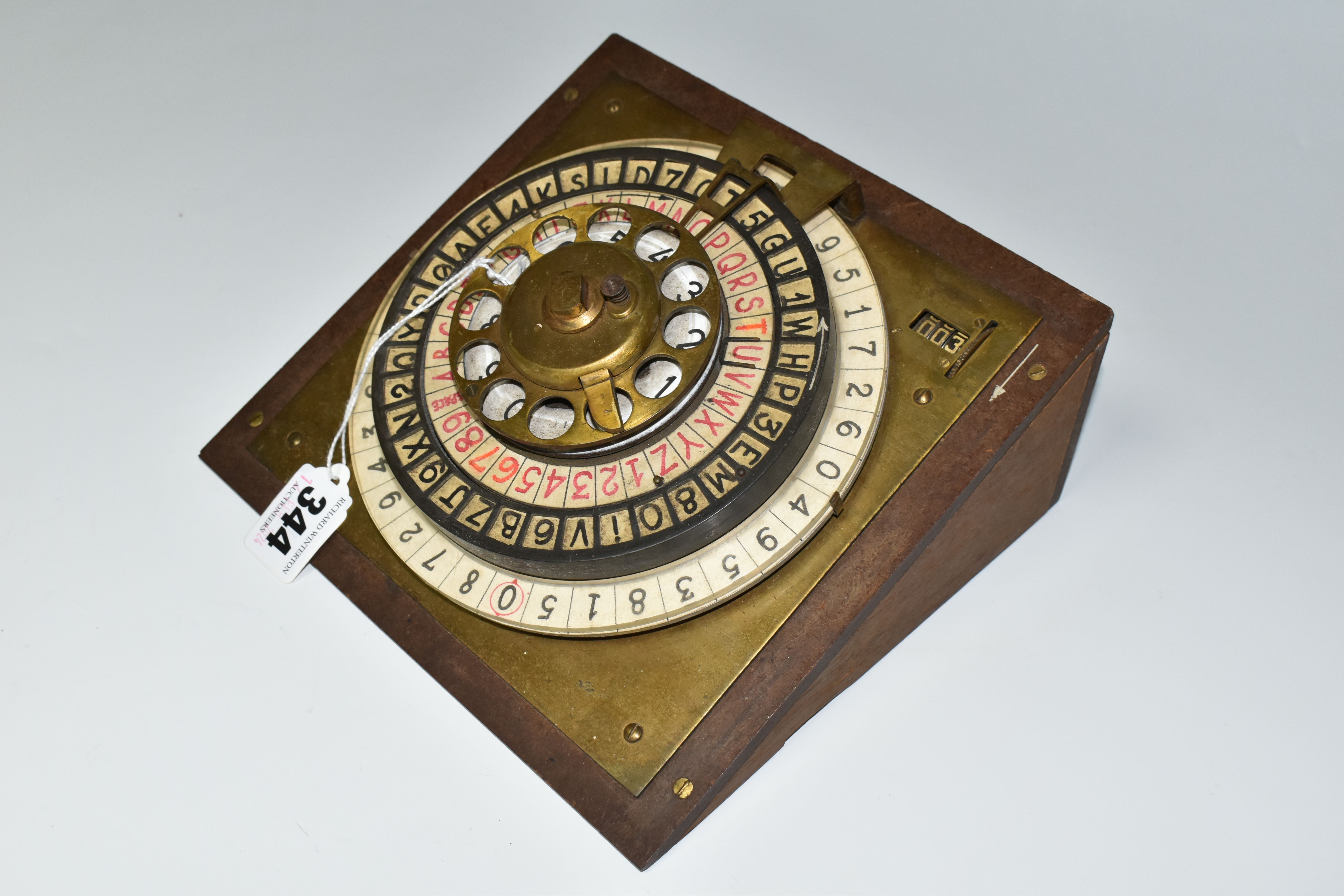 A SCRATCHBUILT DISK CIPHER/CODING MACHINE, with four wheels of letters and numbers, on an angled - Image 4 of 7