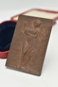 A CASED BRONZE 'TUNBRIDGE WELLS ARTS AND CRAFTS' PLAQUE, dated 1926, depicting a lady with camera,
