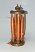 A WOODEN BOBBIN WITH FOUR SPINDLES OF THREAD, the bobbin is stamped 'Cromer' at one end, height
