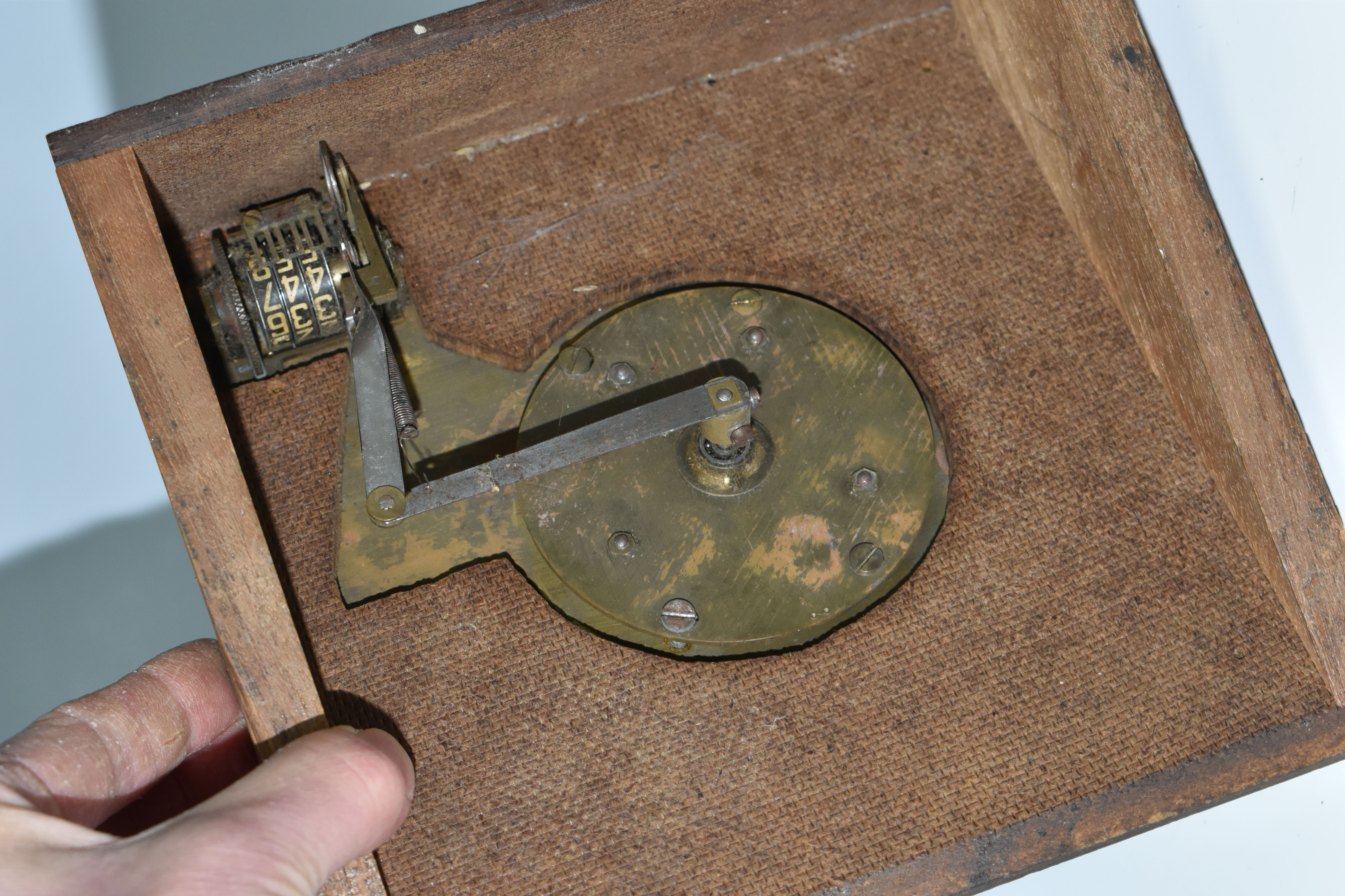 A SCRATCHBUILT DISK CIPHER/CODING MACHINE, with four wheels of letters and numbers, on an angled - Image 7 of 7