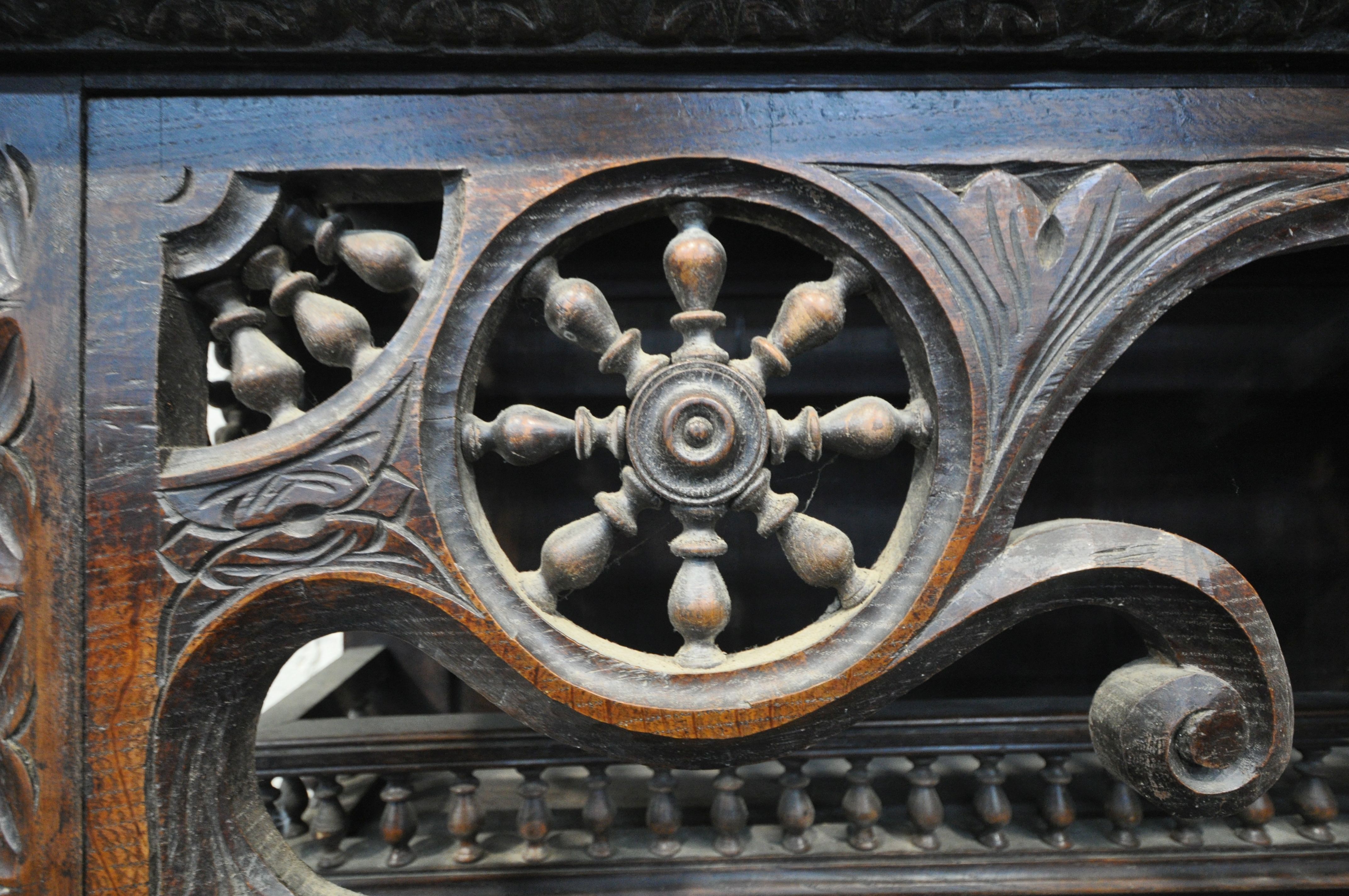 A TALL HARDWOOD WALL CABINET, with a variety of intricate carved designs, consisting of spindles, - Image 3 of 10