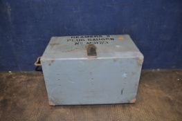 A MILITARY WOODEN TOOL CHEST marked for Reamers and Plug gauges containing round and square bar,