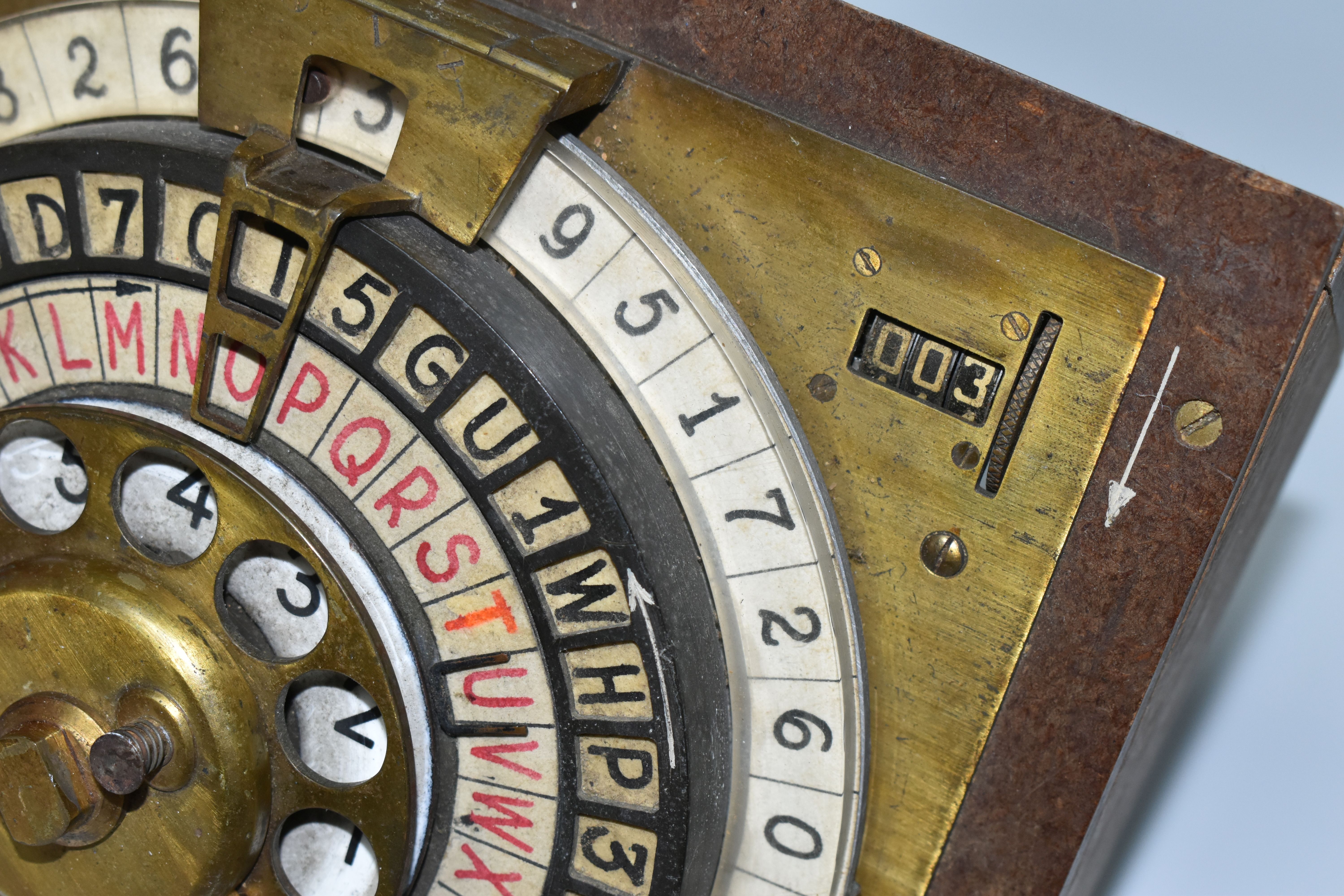 A SCRATCHBUILT DISK CIPHER/CODING MACHINE, with four wheels of letters and numbers, on an angled - Image 3 of 7