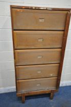 A GOVERNMENT ISSUE STAVERTON OAK BOOKCASE, with five rise and fall doors, enclosing an arrangement