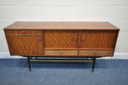 A MID CENTURY MILWOOD TEAK SIDEBOARD, with an arrangement of three drawers and three cupboard doors,