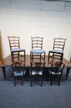 A VICTORIAN MAHOGANY EXTENDING PULL-OUT DINING TABLE, with three additional leaves, on turned legs