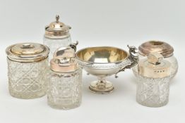 FIVE SILVER TOPPED JARS AND A TWIN HANDLE DISH, to include two glass toilet jars with open silver