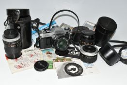 A BOX CONTAINING A CANON CAMERA AND LENSES, to include a Canon AE-1 camera fitted with an f1.8
