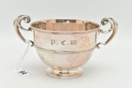 A GEORGE V GOLDSMITHS AND SILVERSMITHS COMPANY LTD SILVER TWIN HANDLED CHRISTENING BOWL, scrolled