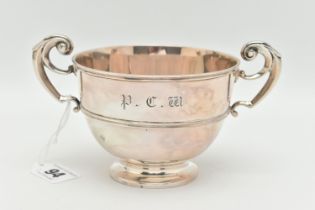 A GEORGE V GOLDSMITHS AND SILVERSMITHS COMPANY LTD SILVER TWIN HANDLED CHRISTENING BOWL, scrolled