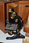 A CASED MICROSCOPE AND VINTAGE PREPARED SLIDES, comprising a B & J Beck Ltd cased microscope, and
