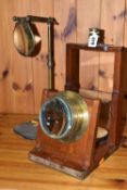 TWO PIECES OF OPTICAL EQUIPMENT, the largest by Horne Thornthwaite & Wood of London, having a wooden
