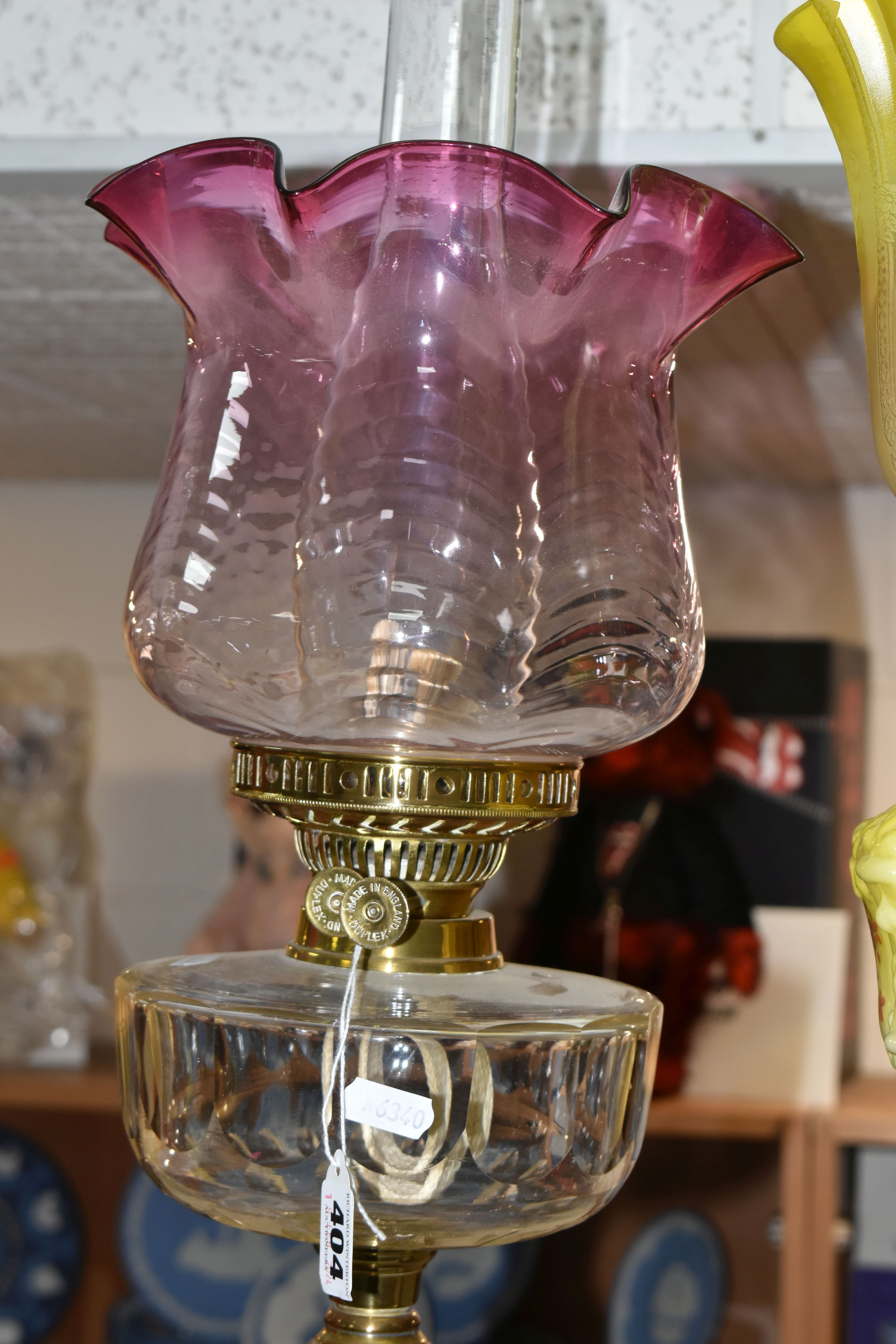TWO VICTORIAN OIL LAMPS, one has an etched yellow glass shade, moulded yellow milk glass reservoir - Image 3 of 10