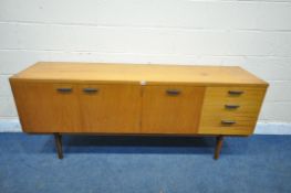 A MID CENTURY UNIFLEX TEAK SIDEBOARD, fitted with three drawers, top drawer with cutlery dividers,