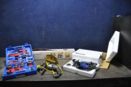 A POWERFIX PIPE THREADING KIT in case, a Ferm SDS breaker brand new in box, a clamping workbench,