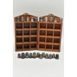 A SELECTION OF SILVER THIMBLES AND TWO DISPLAY UNITS, to include twenty-two thimbles, various